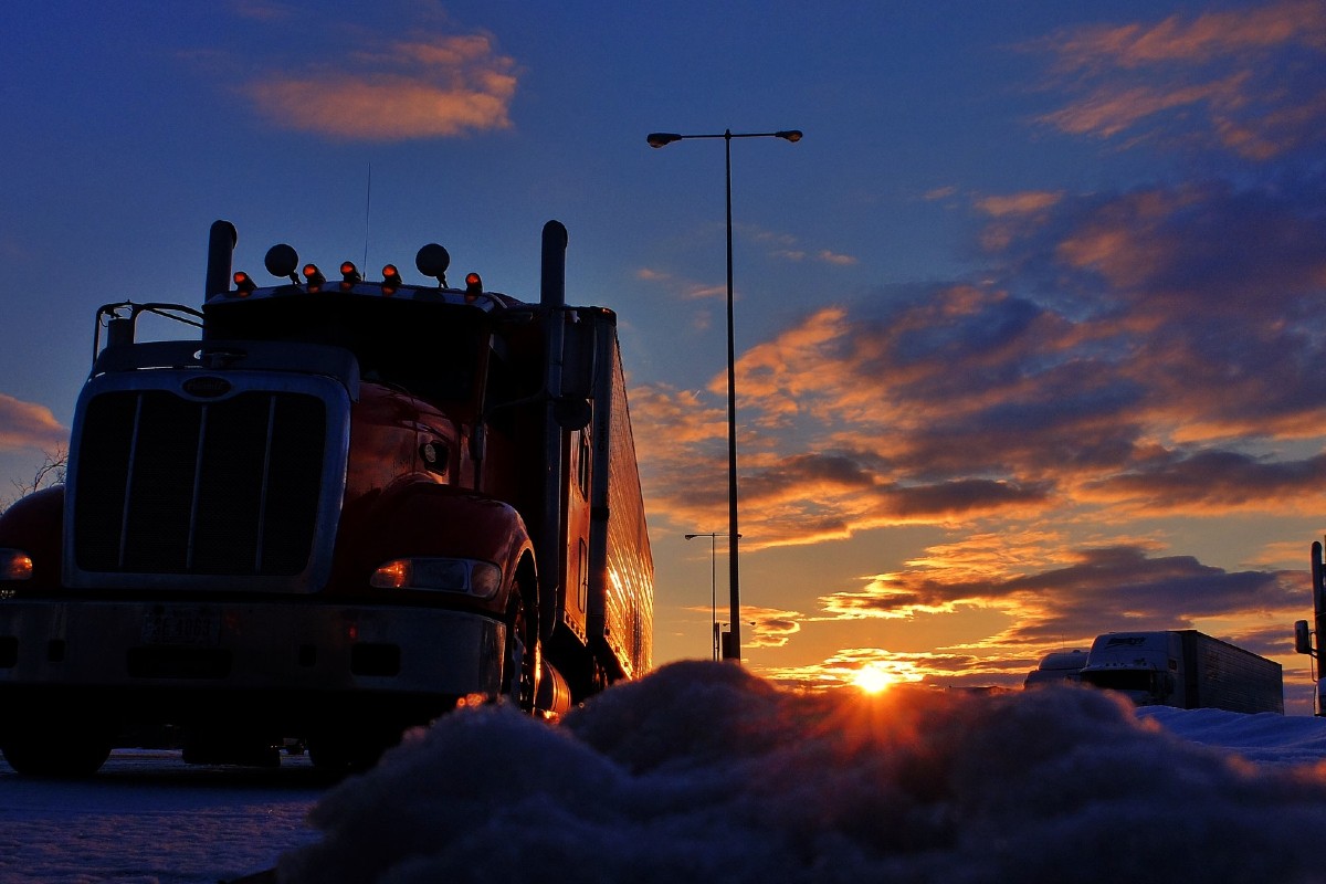 Semi truck and sunrise